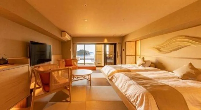 Bed in Hotel Takeshima