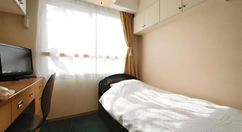 Bed in Hotel Matsumotoro