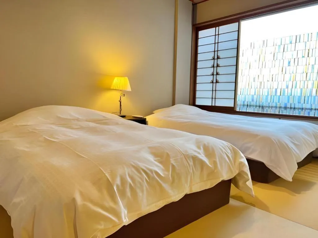 Bed in Hotel Matsumotoro