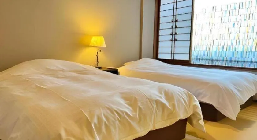 Bed in Hotel Matsumotoro