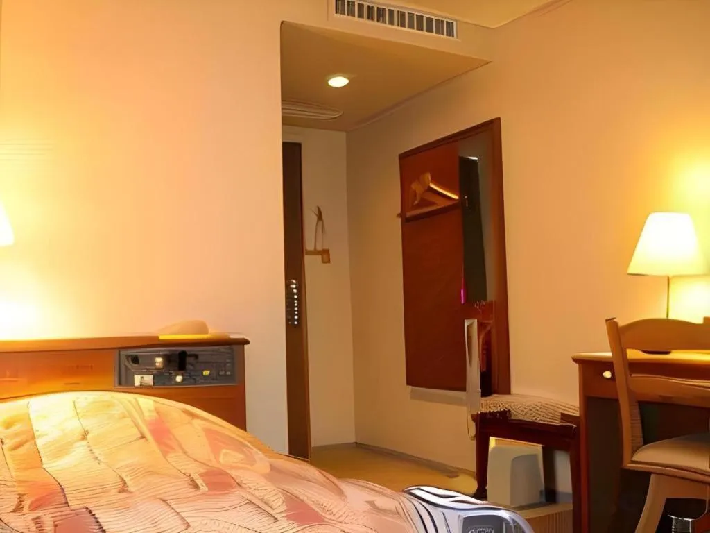 Bed in Hotel Fukui Castle