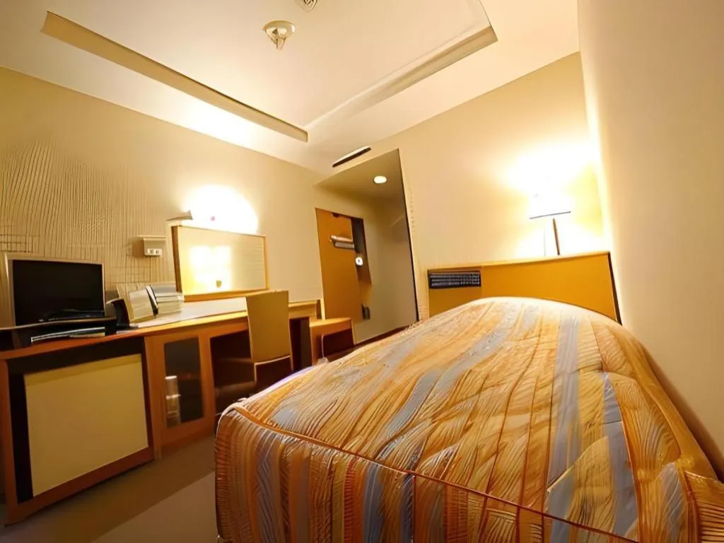 Bed in Hotel Fukui Castle