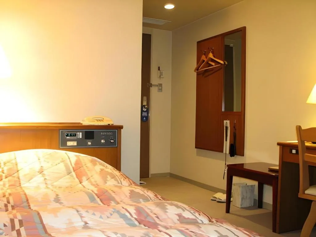 Bed in Hotel Fukui Castle