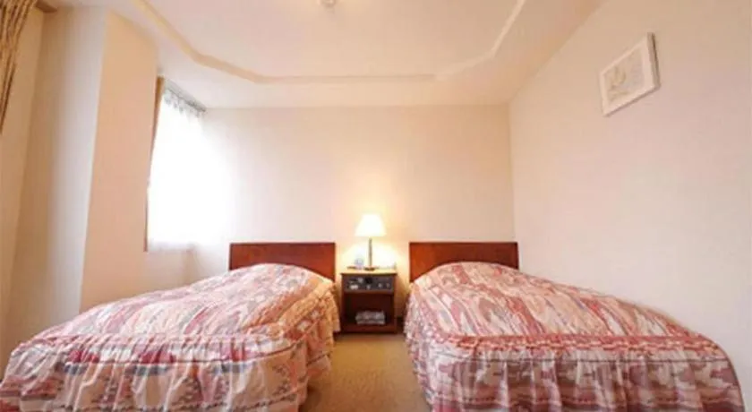 Bed in Hotel Fukui Castle