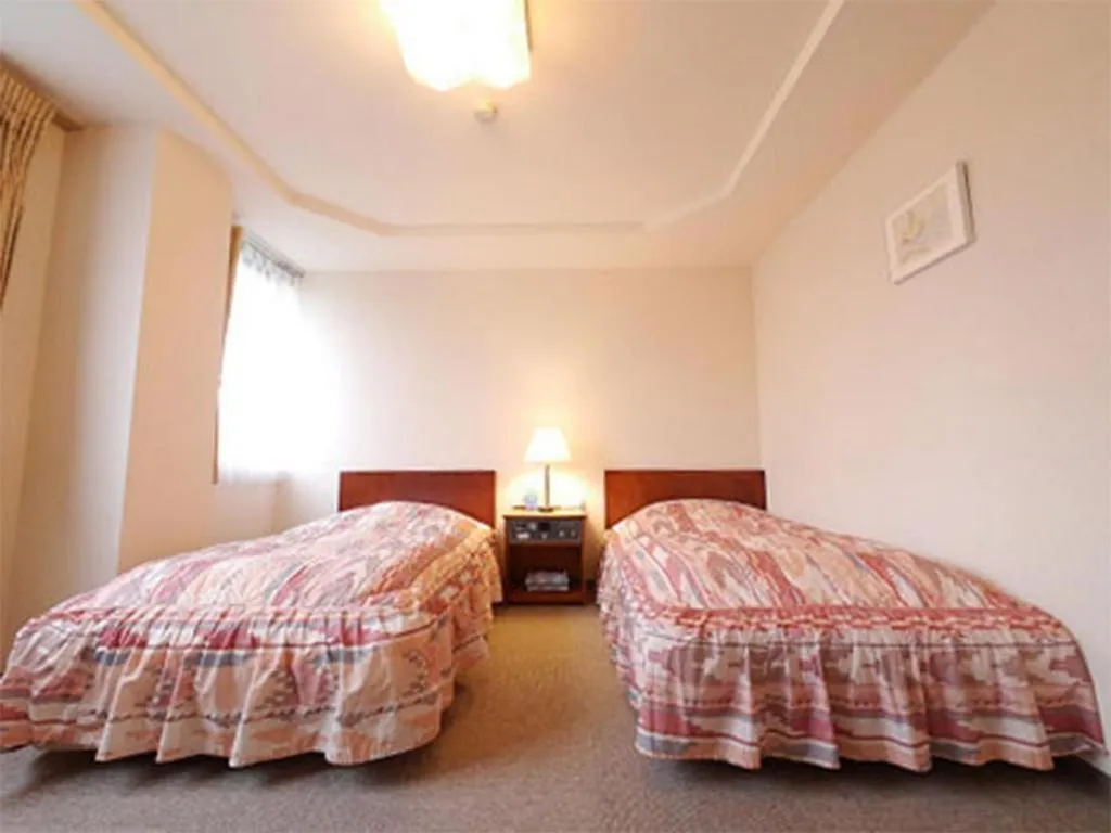 Bed in Hotel Fukui Castle