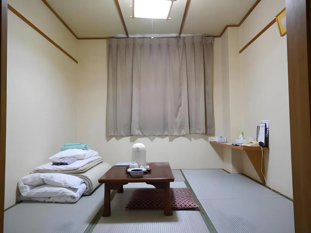 Bed in Hotel Fukui Castle