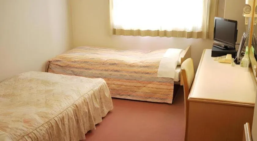 Bed in Hotel Fukui Castle