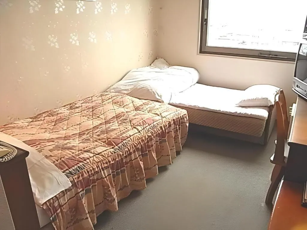 Bed in Hotel Fukui Castle