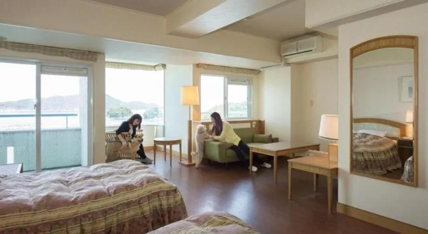 Bed in Izumigo Toba Dog Paradise Hotel