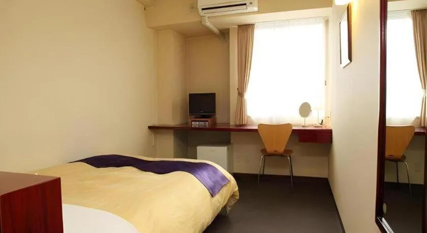 Bed in Hotel 1-2-3 Kofu Shingen Onsen