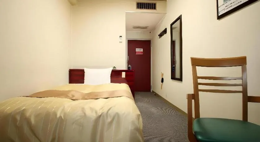 Bed in Hotel 1-2-3 Kofu Shingen Onsen