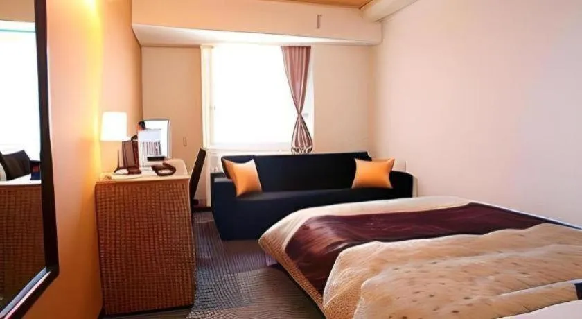 Bed in Hotel 1-2-3 Kofu Shingen Onsen