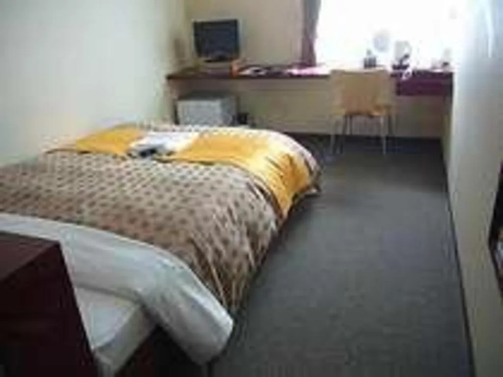 Bed in Hotel 1-2-3 Kofu Shingen Onsen