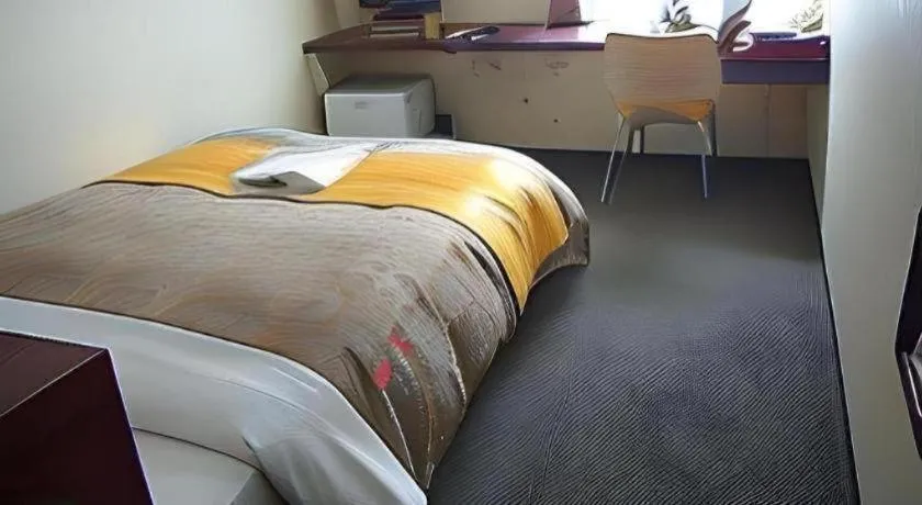 Bed in Hotel 1-2-3 Kofu Shingen Onsen