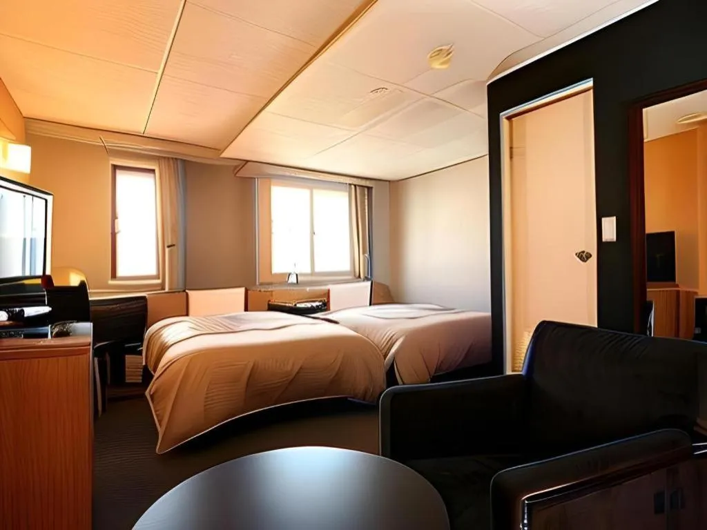 Bed in Hotel 1-2-3 Kofu Shingen Onsen