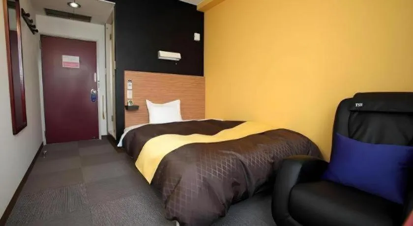 Bed in Hotel 1-2-3 Kofu Shingen Onsen