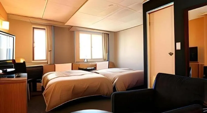 Bed in Hotel 1-2-3 Kofu Shingen Onsen