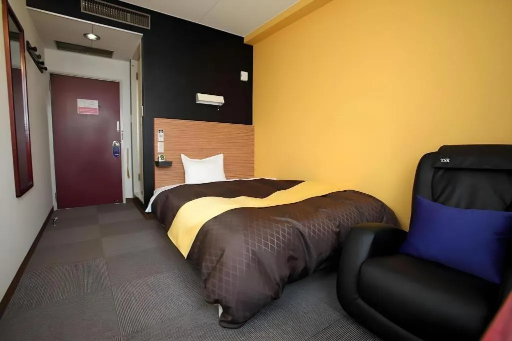 Bed in Hotel 1-2-3 Kofu Shingen Onsen