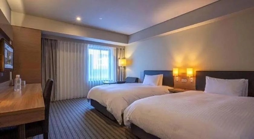 Bed in HOTEL UNIZO Osaka Yodoyabashi