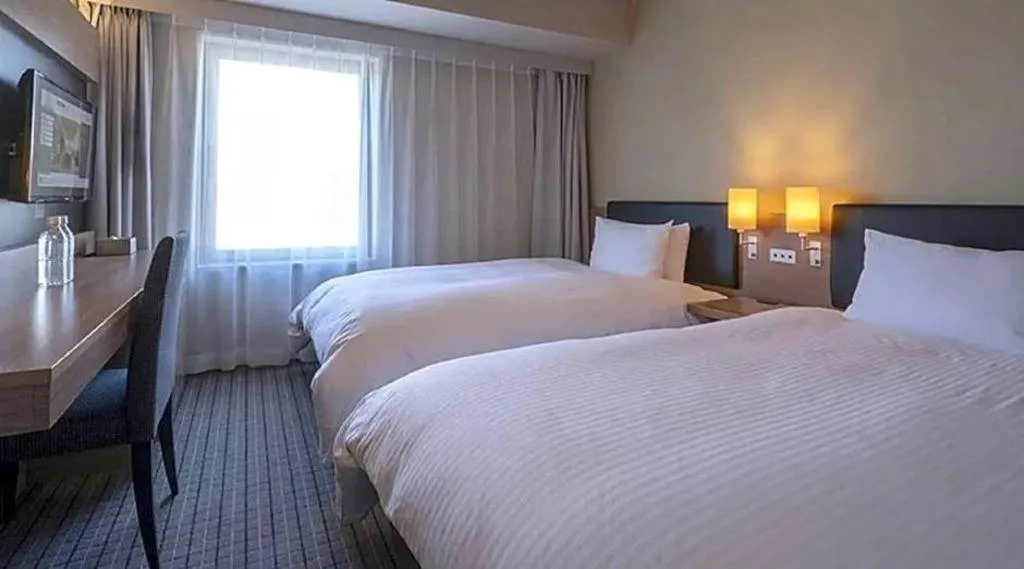 Bed in HOTEL UNIZO Osaka Yodoyabashi