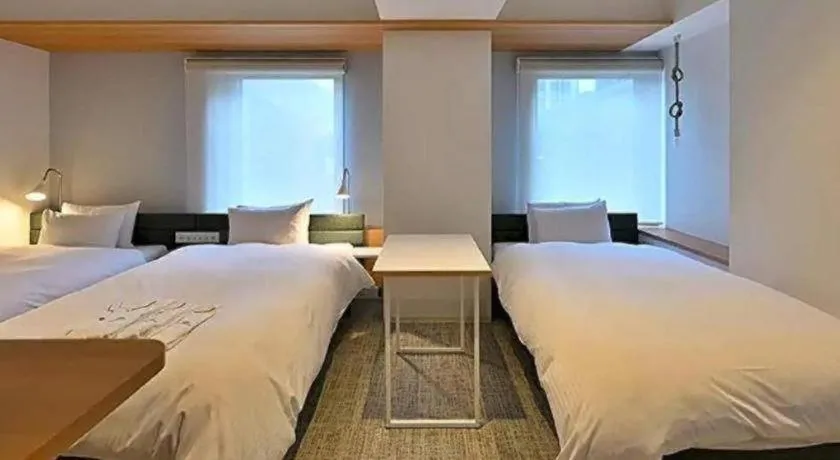 Bed in HOTEL UNIZO Osaka Yodoyabashi