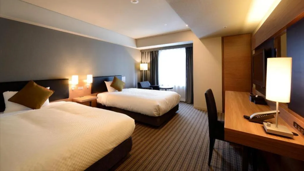 Bed in HOTEL UNIZO Osaka Yodoyabashi