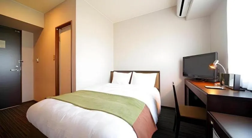 Bed in Green Hotel Yes Nagahama Minatokan