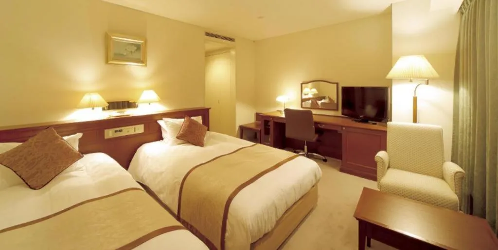 Bed in Hotel Harvest In Yonago