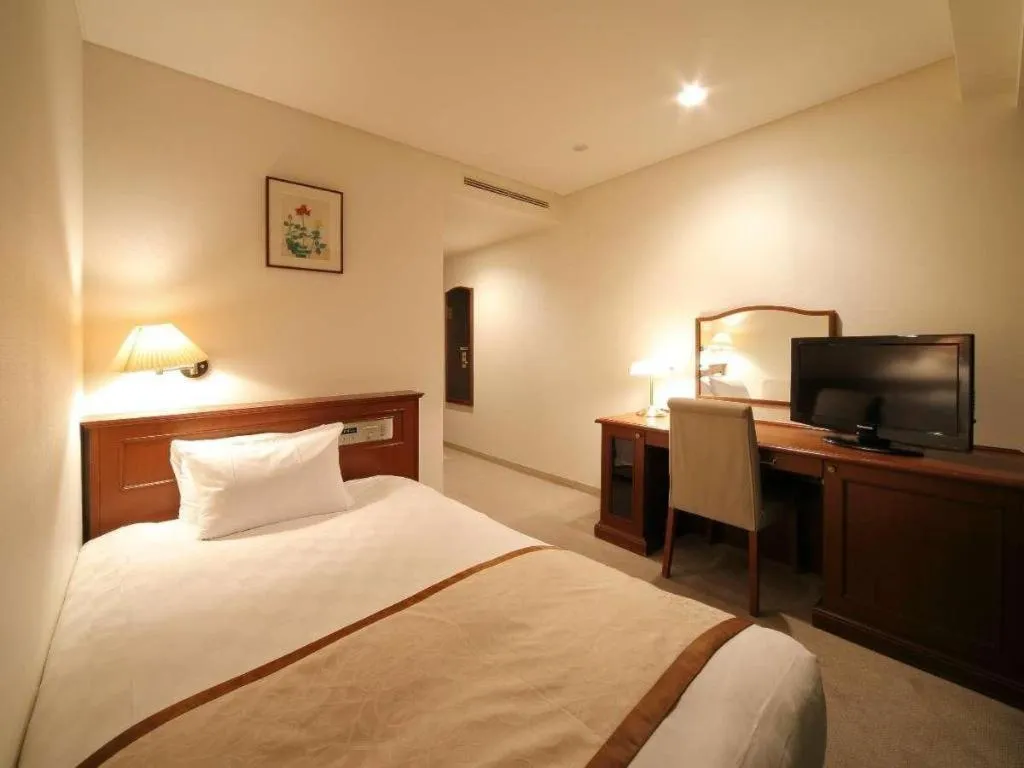 Bed in Hotel Harvest In Yonago