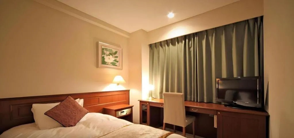 Bed in Hotel Harvest In Yonago