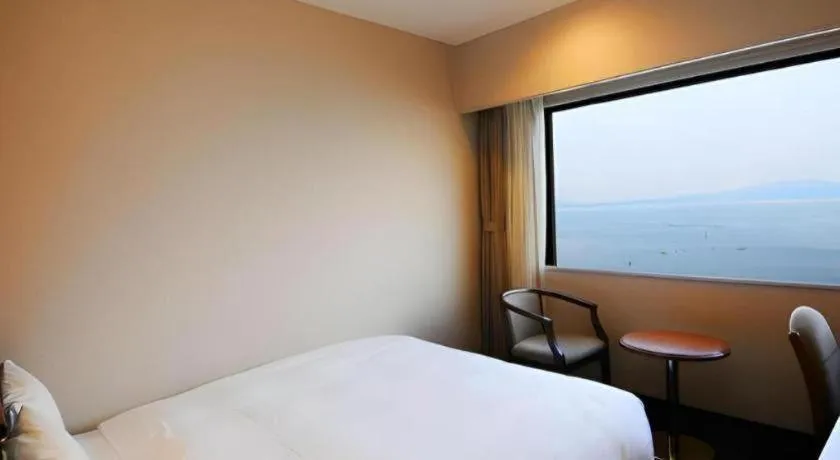 Bed in Imazu Sun Bridge Hotel