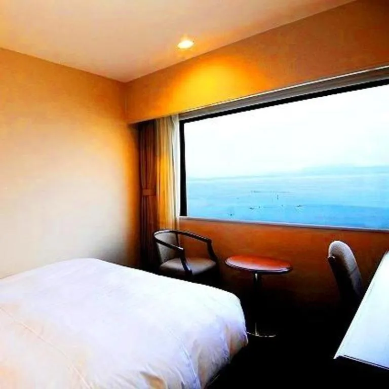 Bed in Imazu Sun Bridge Hotel