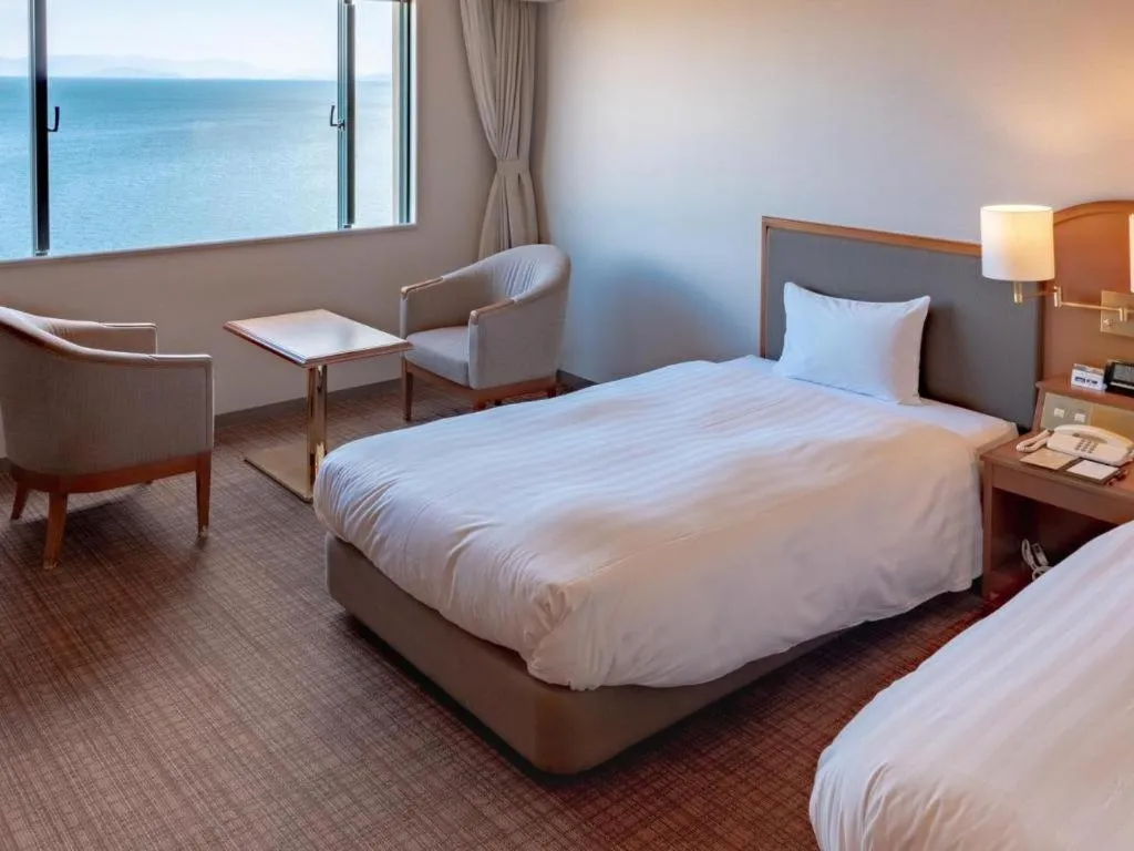 Bed in Imazu Sun Bridge Hotel