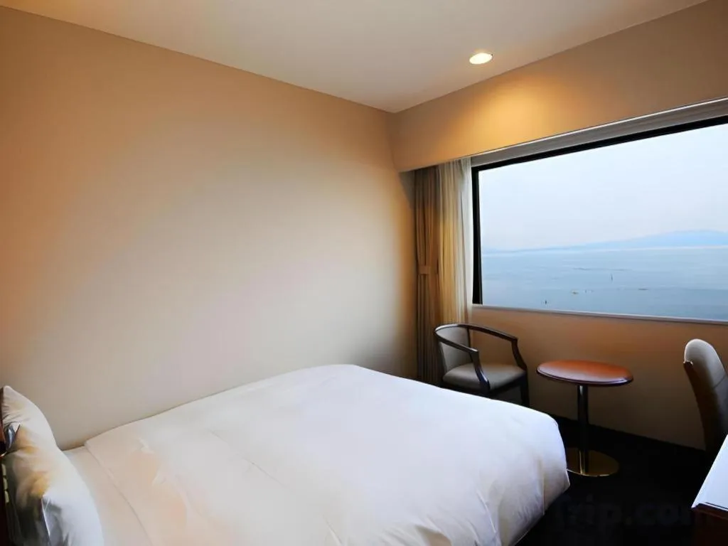 Bed in Imazu Sun Bridge Hotel
