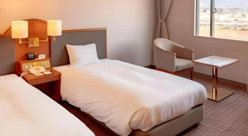 Bed in Imazu Sun Bridge Hotel