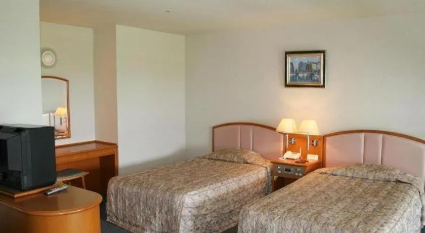 Bed in Izumigo AMBIENT Izu-Kogen Condominium