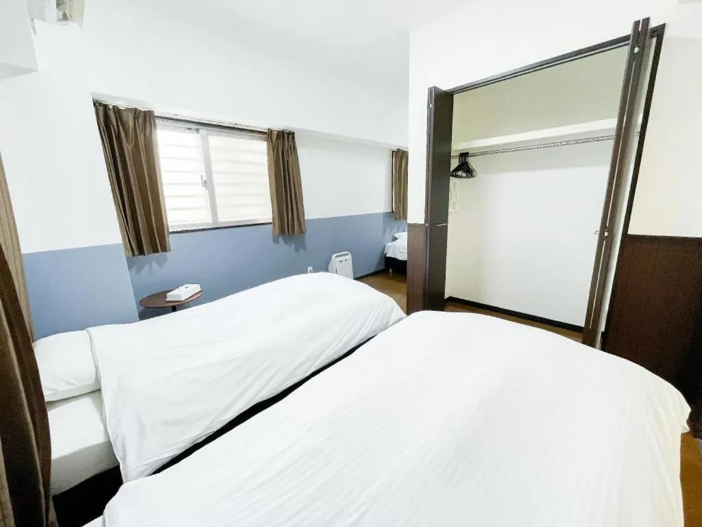 Bed in Villa Coast Nishimachi - Guesthouse in Okinawa