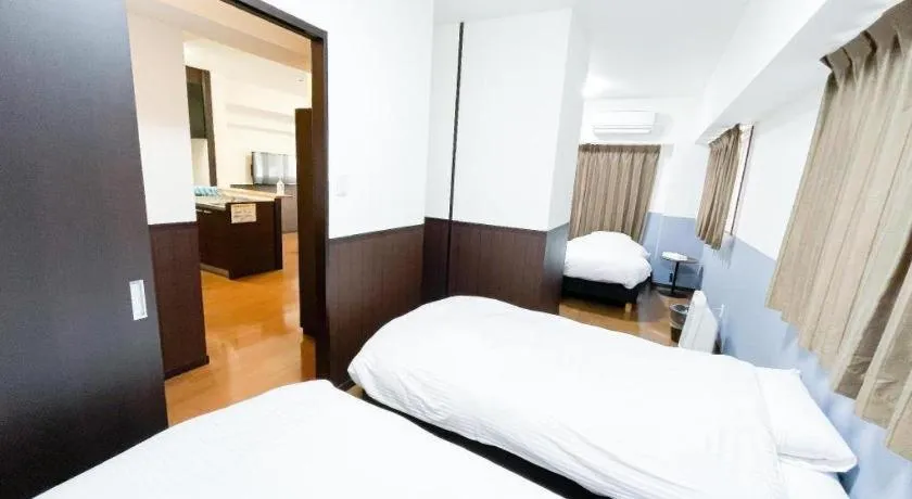 Bed in Villa Coast Nishimachi - Guesthouse in Okinawa