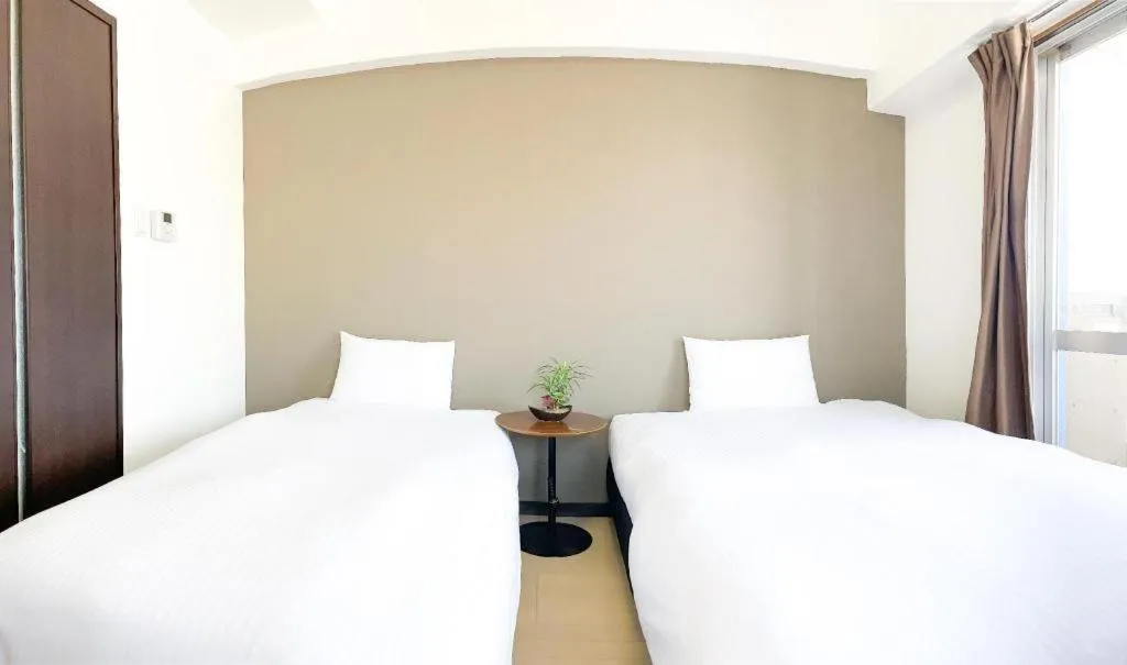 Bed in Villa Coast Nishimachi - Guesthouse in Okinawa