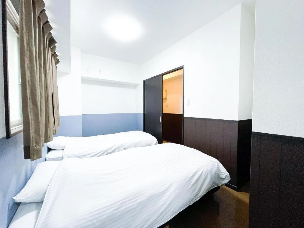 Bed in Villa Coast Nishimachi - Guesthouse in Okinawa