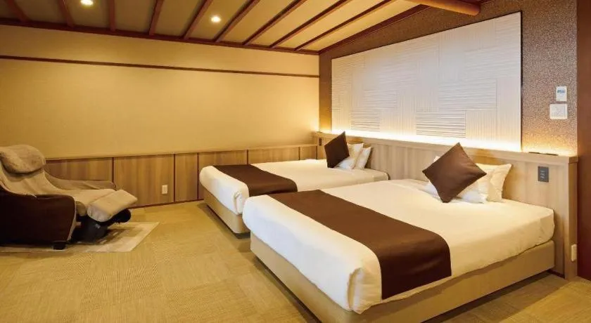 Bed in Hotel Kogure