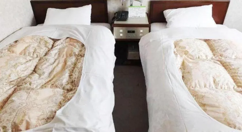 Bed in Sento Otani Hotel