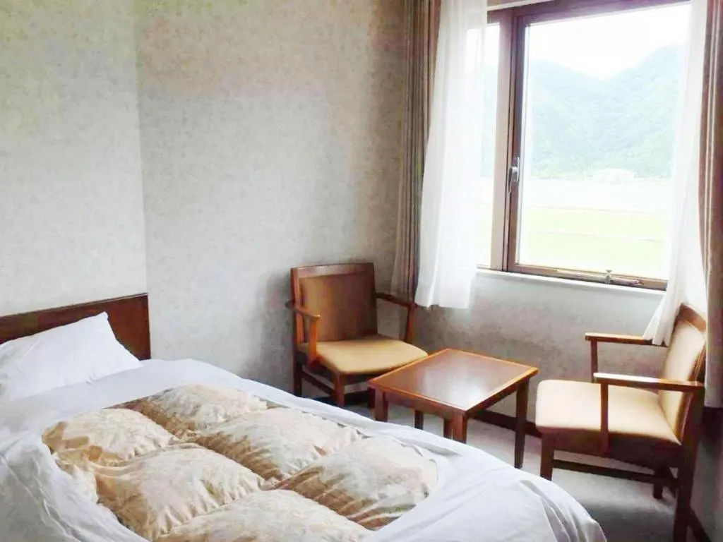 Bed in Sento Otani Hotel