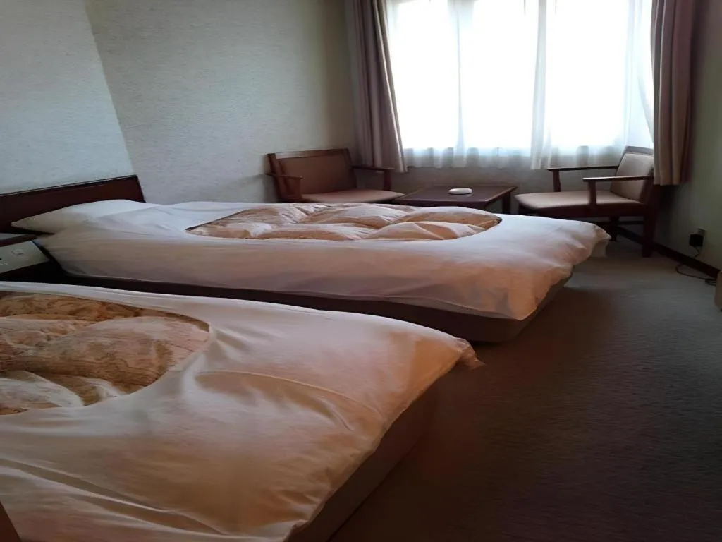 Bed in Sento Otani Hotel