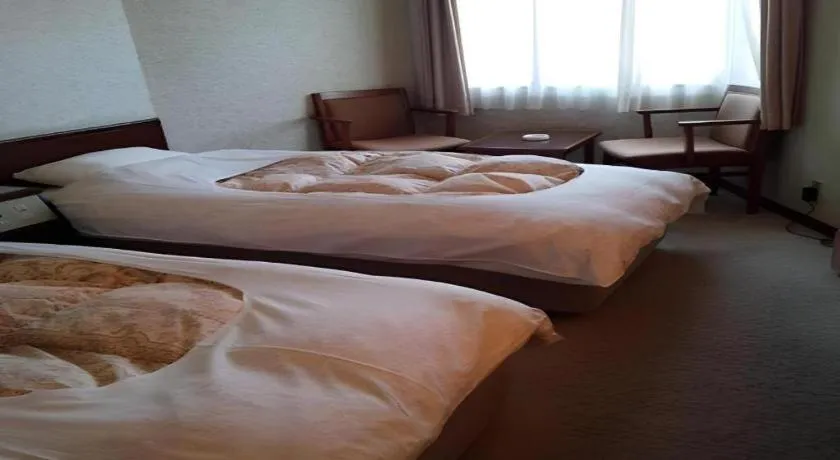 Bed in Sento Otani Hotel