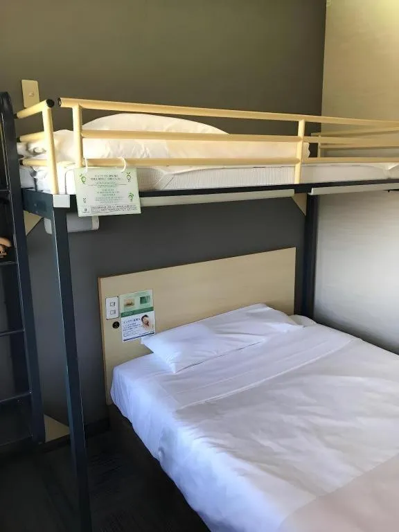 Bed in Super Hotel Arai-Niigata