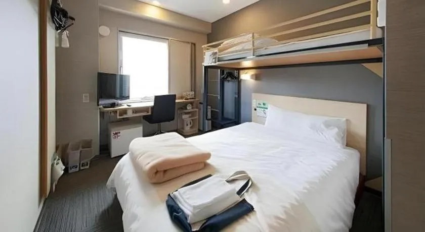Bed in Super Hotel Arai-Niigata