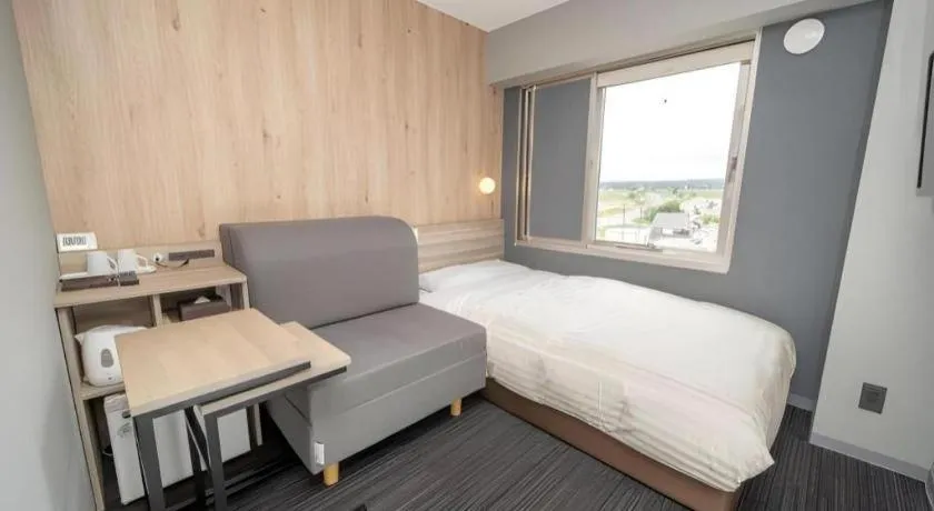 Bed in Super Hotel Arai-Niigata