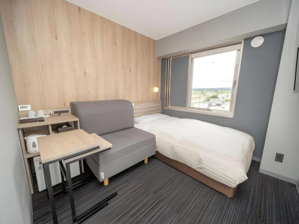 Bed in Super Hotel Arai-Niigata