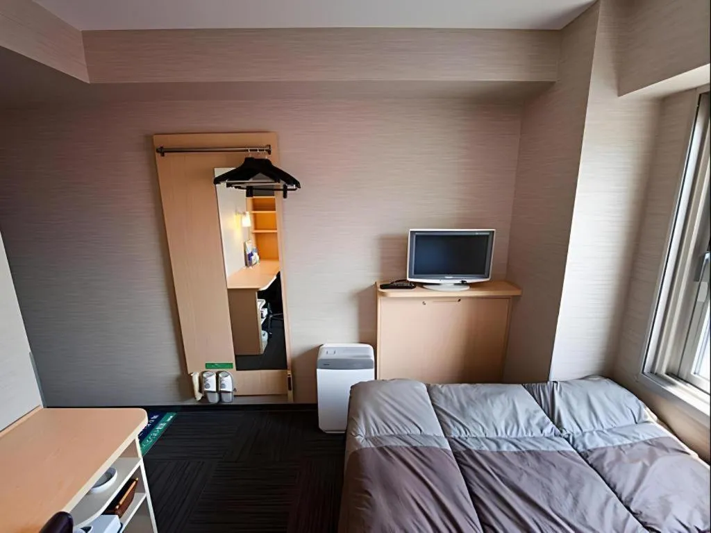 Bed in Super Hotel Arai-Niigata